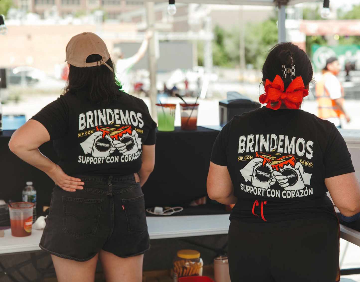 BRINDEMOS Tee – “Support Con Corazón” Edition